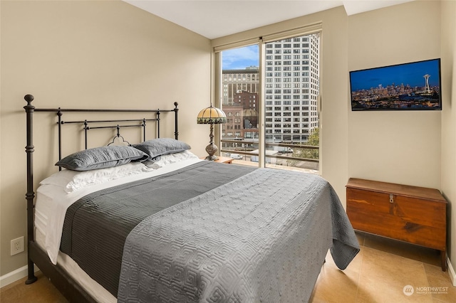 bedroom featuring tile patterned flooring