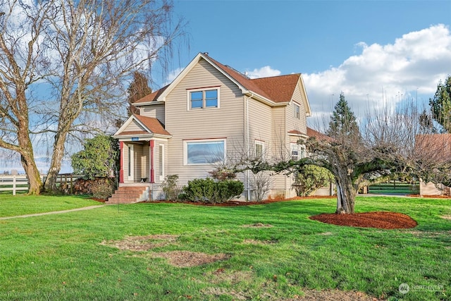 view of front property with a front lawn