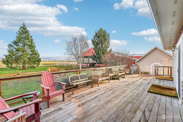 wooden deck featuring outdoor lounge area