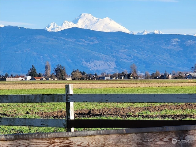 mountain view featuring a rural view