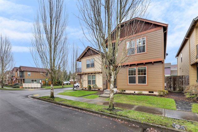 view of front facade featuring a front yard