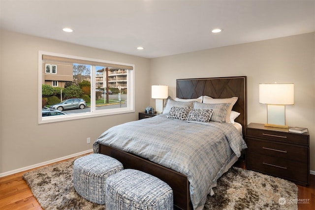 bedroom with light wood-type flooring