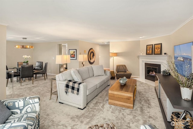 living room featuring a notable chandelier and light colored carpet