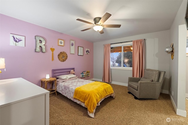 carpeted bedroom with ceiling fan