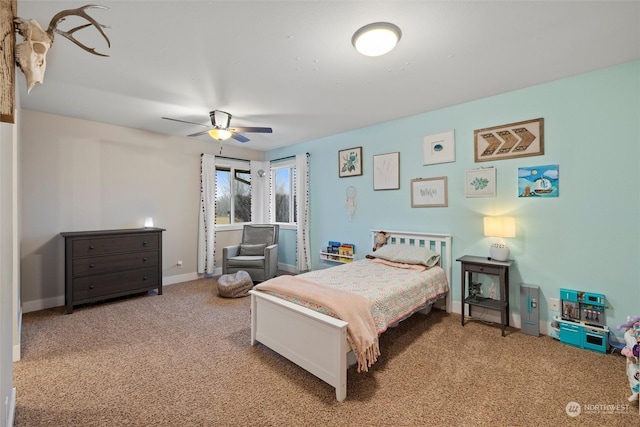 carpeted bedroom with ceiling fan