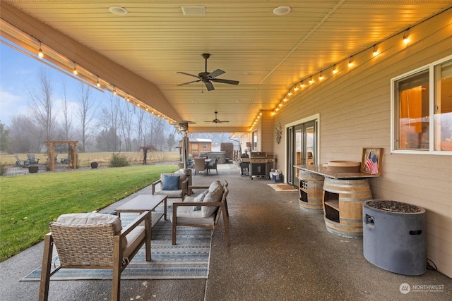 view of patio / terrace with an outdoor hangout area and ceiling fan