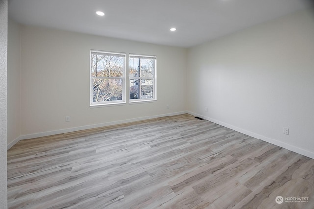 empty room featuring light hardwood / wood-style flooring