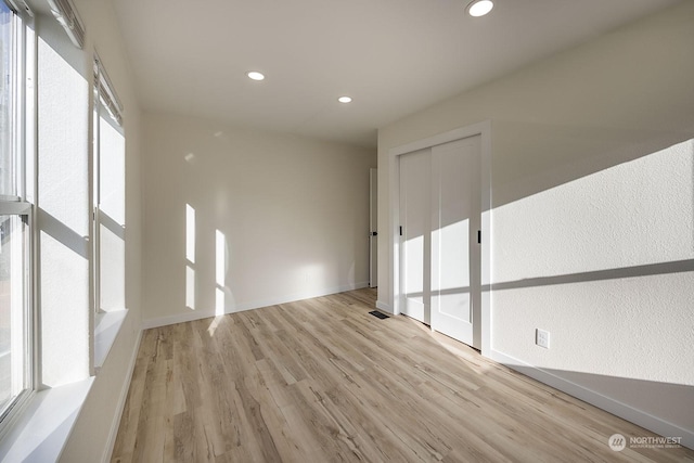 empty room featuring light wood-type flooring