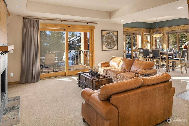 living room featuring light carpet