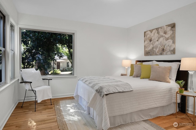 bedroom featuring light wood-type flooring