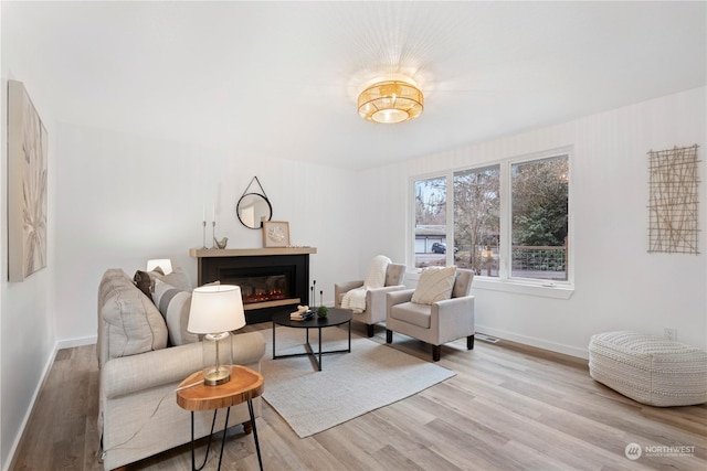 living area featuring light hardwood / wood-style floors