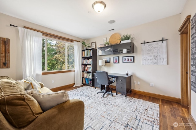 home office featuring light hardwood / wood-style flooring