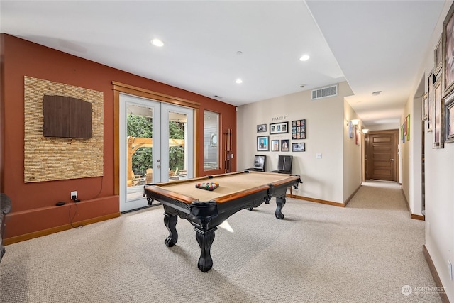 recreation room with light carpet, billiards, and french doors