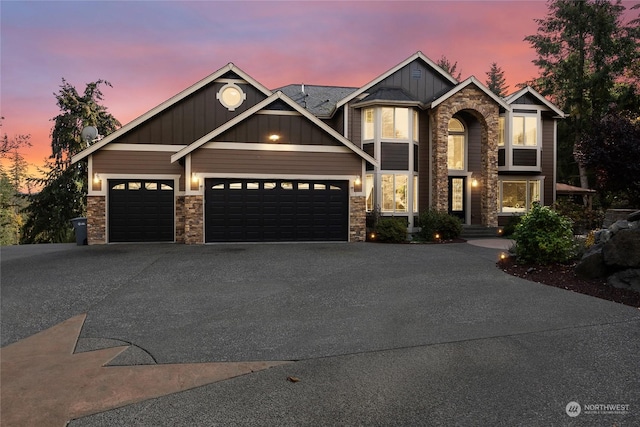 craftsman inspired home featuring a garage