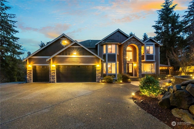 craftsman inspired home featuring a garage