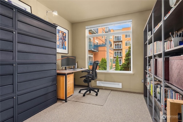 carpeted office space featuring a healthy amount of sunlight