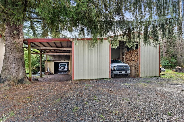 view of outdoor structure with a carport