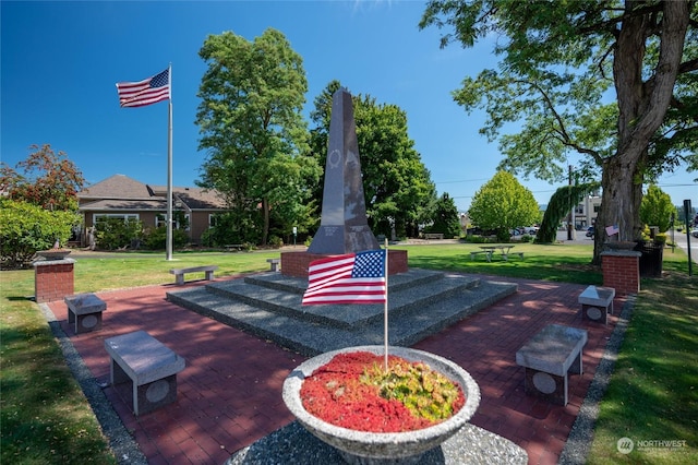 view of community featuring a yard