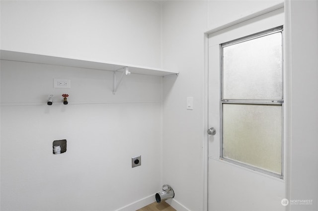 clothes washing area with hookup for an electric dryer