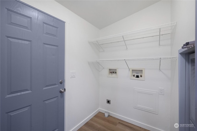 laundry room featuring wood-type flooring, electric dryer hookup, and washer hookup