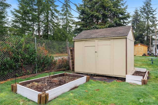 view of outdoor structure with a yard