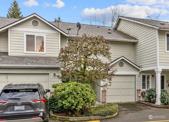 view of front of property with a garage