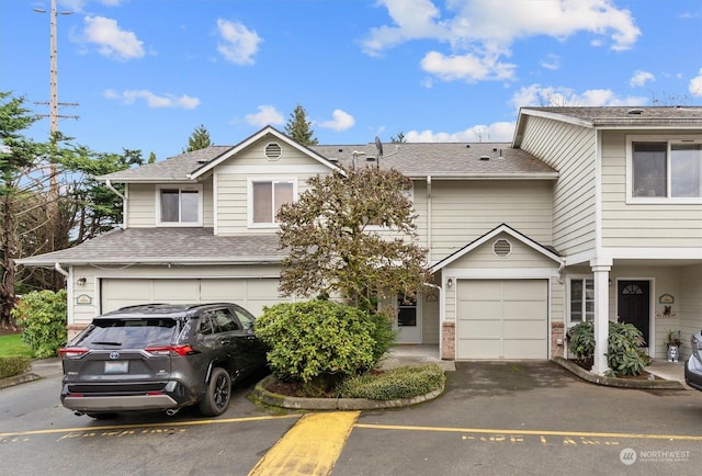 view of front of property with a garage