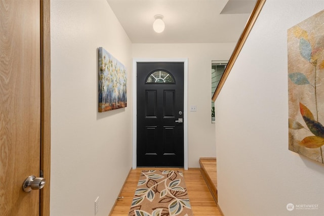 doorway to outside with light hardwood / wood-style floors