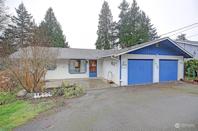 view of front of property with a garage