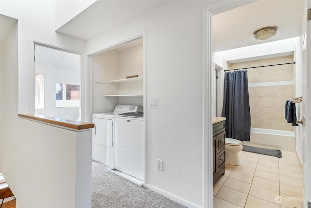 full bathroom with tile patterned flooring, independent washer and dryer, toilet, vanity, and shower / bathtub combination with curtain