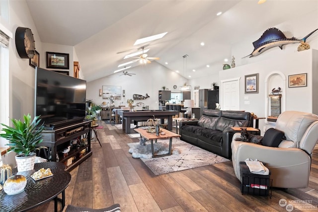 living room featuring high vaulted ceiling, ceiling fan, and dark wood-type flooring