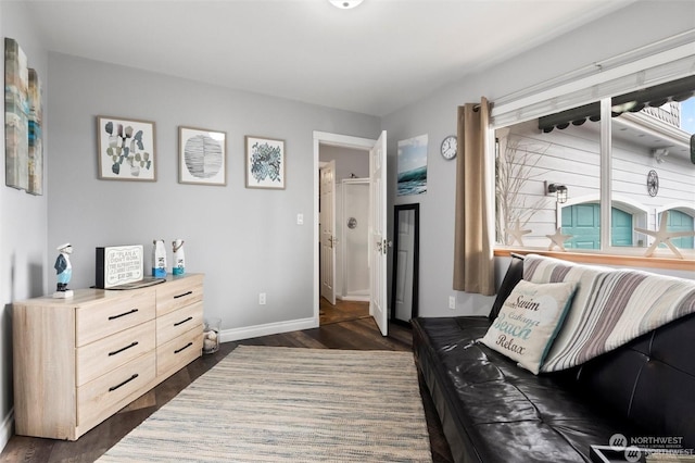 living area with dark hardwood / wood-style flooring