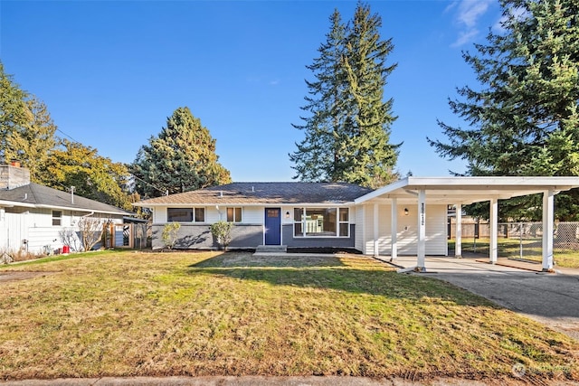 single story home featuring a front yard and a carport