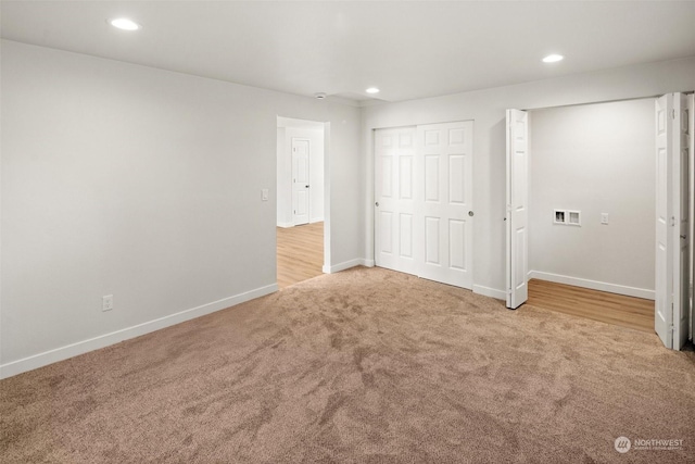 unfurnished bedroom featuring carpet flooring