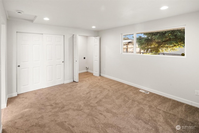 unfurnished bedroom featuring carpet