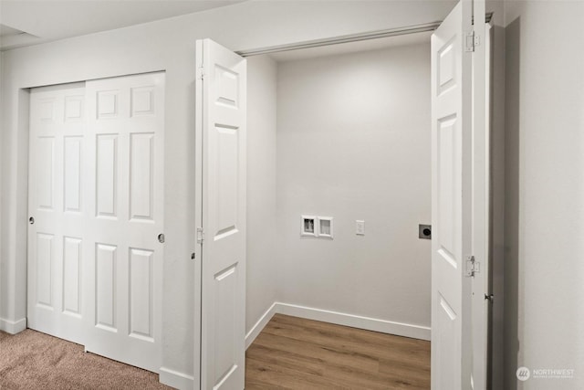 washroom featuring washer hookup, hardwood / wood-style flooring, and electric dryer hookup