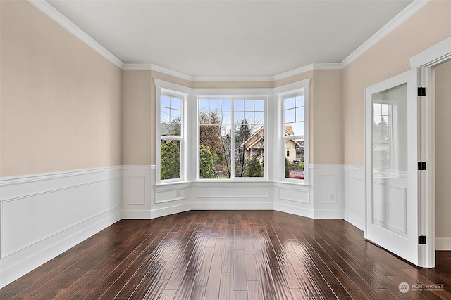 unfurnished room with crown molding and dark wood-type flooring