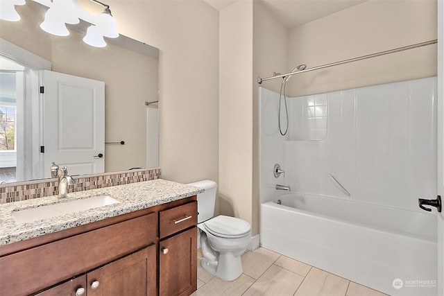 full bathroom with backsplash, tile patterned floors, bathing tub / shower combination, toilet, and vanity