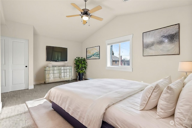 bedroom featuring ceiling fan, carpet, and vaulted ceiling