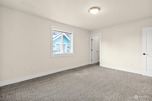 unfurnished room with carpet