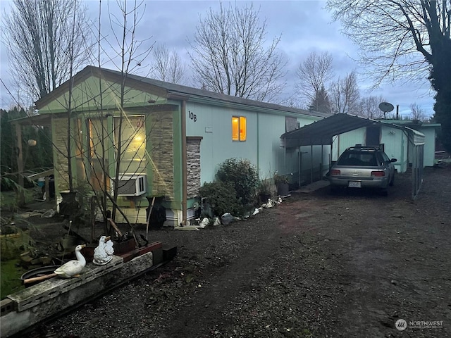 view of home's exterior featuring cooling unit