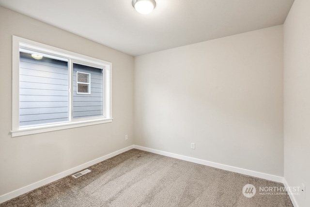 view of carpeted spare room