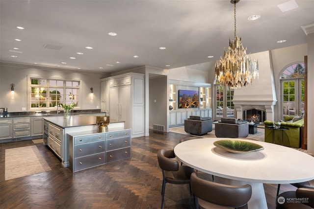 dining room with dark parquet flooring and crown molding