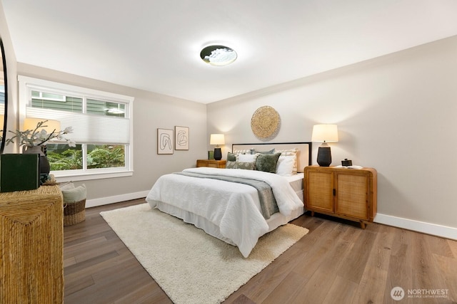 bedroom featuring hardwood / wood-style floors