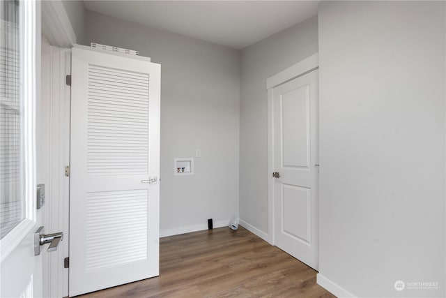 washroom featuring washer hookup and hardwood / wood-style flooring