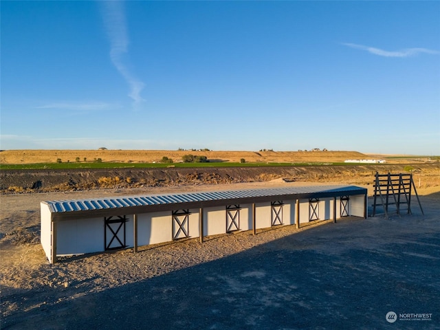 exterior space with a rural view