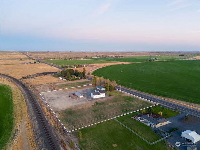 aerial view at dusk with a rural view