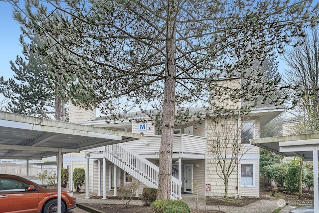 exterior space featuring a carport