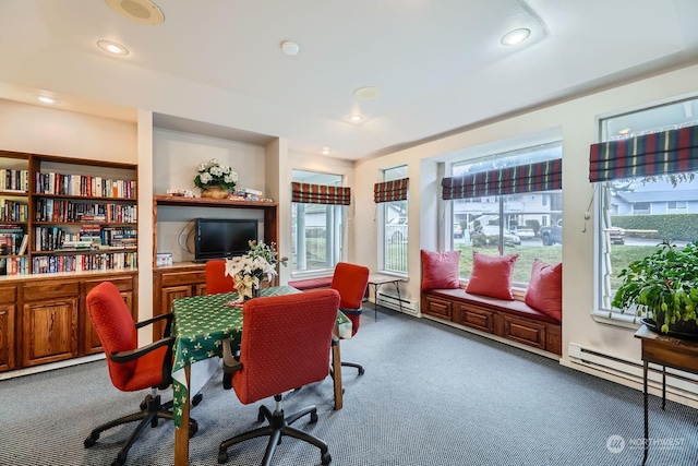 office area featuring carpet and a baseboard heating unit