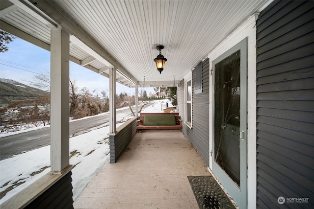 view of snow covered patio